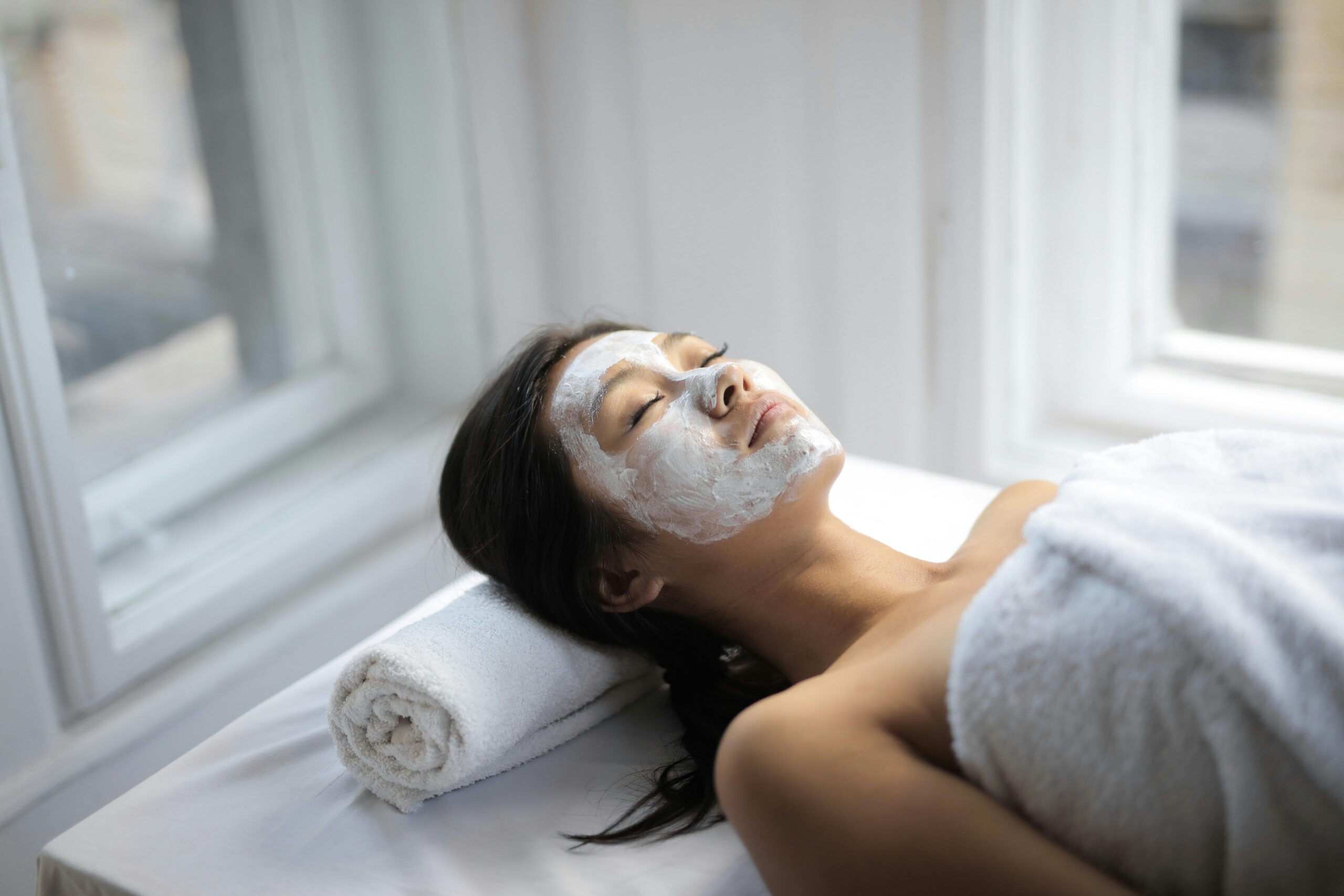 Washing face gently with cleanser at night