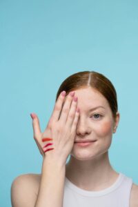 Model with cheek swatches and warm, cool, neutral undertone guide.