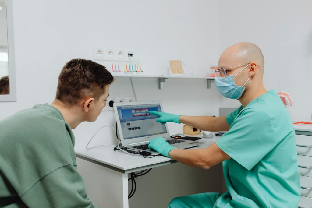 doctor consulting patient during health checkup
